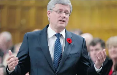  ?? ADRIAN WYLD/The Canadian Press ?? Prime Minister Stephen Harper responds to a question in question period in the House of Commons on Thursday. Harper
chose to tussle over the Senate, calculatin­g that it wouldn’t be fatal, Michael Den Tandt writes.