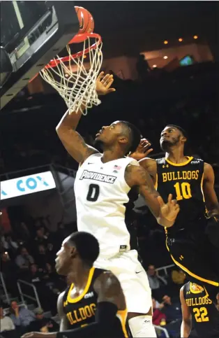  ?? Photo by Ernest A. Brown ?? Providence College center Nate Watson (0) was simply too big for Bowie State in the Friars’ exhibition win Saturday. Watson scored a team-high 14 points on 7-for-11 shooting.