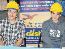  ?? DESIREE ANSTEY/JOURNAL PIONEER ?? Declan Rockwell, from left, and Evan Aylward proudly represent Castle Spring Valley Building Centre at the Young Leaders Program Tradeshow.