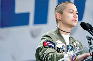  ?? AP Photo/Andrew Harnik ?? ■ Emma Gonzalez, a survivor of the mass shooting at Marjory Stoneman Douglas High School in Parkland, Fla., cries as she stands at the podium during the March for Our Lives rally March 24 in Washington, D.C. Gonzalez remained silent for the amount of...