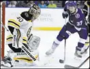  ?? Chris O’Meara The Associated Press ?? Bruins goalie Tuukka Rask stops a second-period shot by Lightning center Yanni Gourde (37) during Boston’s 3-0 win Saturday at Amalie Arena.