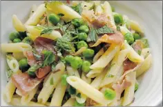  ?? — POSTMEDIA NEWS ?? Pea, prosciutto and pasta salad is made with a generous sprinkling of fresh herbs.