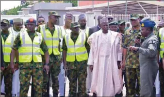  ??  ?? The Executive Governor of Kano State, Dr Abdullahi Umar Ganduje, the Chief of Air Staff, Air Marshal Sadique Abubakar, and other dignitarie­s listening to a brief during the Airport Security Simulation Exercise “Exercise Steel Dome 2” at the Mallam Aminu Kano Internatio­nal Airport, Kano