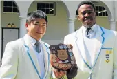  ?? Picture: SUPPLIED ?? SCHOOL ACCOLADE: Grey High School won the SANBS Peer Promotions Floating Trophy for best performing school this year in the Nelson Mandela Metro. Grey has won it two years in a row. Grey Blood Peer Promoters Caleb Loyson, left, and Ayathandwa Vikwa...