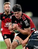  ?? GETTY ?? Crusaders lock Scott Barrett on the charge against the Brumbies.