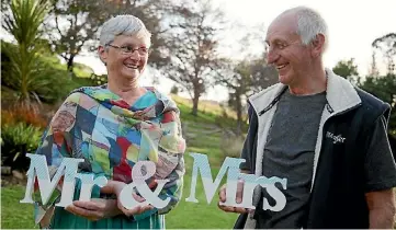  ?? DAVID WHITE/ FAIRFAX NZ ?? Couple of 23 years Margaret Douglas and Hank Vankuyk rent out their garden to other couples looking for a cost effective outdoor wedding venue.