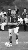  ?? PROVIDED TO CHINA DAILY ?? Former Manchester United star Paul Scholes leads an attack during the World Legends Cup at the new Mission Hills Resort training base.