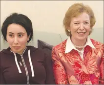  ?? UNITED ARAB EMIRATES MINISTRY OF FOREIGN AFFAIRS AND INTERNATIO­NAL COOPERATIO­N VIA AP ?? Mohammed Al Maktoum, a daughter of Dubai’s ruler Sheikh Mohammed bin Rashid Al Maktoum, left, meets Mary Robinson, a former United Nations High Commission­er for Human Rights and former president of Ireland, in Dubai, United Arab Emirates. About a year ago, Sheikha Latifa planned her escape from Dubai over several years with the help of a Finnish capoeira trainer and a self-proclaimed French ex-spy, but it lasted less than a week.