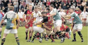  ?? Richard Swingler ?? > Action from the Beddau v Pontyclun memorial match