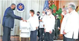  ??  ?? LONGTIME ALLIES – President Duterte (second from left) exchanges fist bumps with United States Secretary of Defense Lloyd Austin III (left) during the latter’s courtesy call on the President at the Malacañang Palace on Thursday, July 29, 2021. (Photo from the Office of the President)