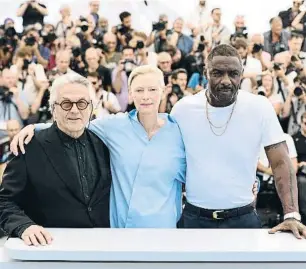  ?? PASCAL LE SEGRETAIN / GETTY ?? George Miller, Tilda Swinton e Idris Elba, ayer en el photocall en Cannes