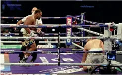  ??  ?? Joseph Parker (right) took an early count against Dereck Chisora.