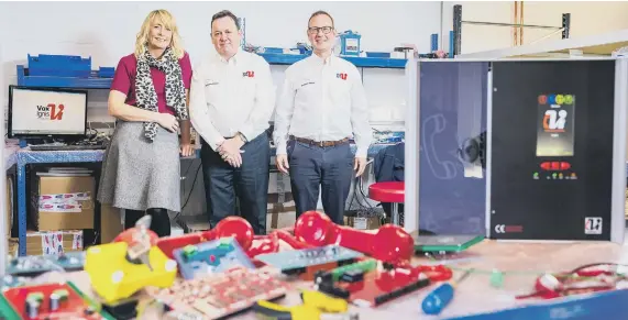  ??  ?? Donna Surtees, BIC centre manager, with Anthony Smith, MD, and Jeremy Kirkup, sales director, of Vox Ignis.