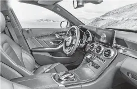  ??  ?? The cabin has a much less cluttered look. Interior design themes include a sculpted dash and one-piece console, fine wood and leather accents, a new 12-button multifunct­ion steering wheel and M-B’s embrace2 connected-car technology.