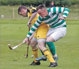  ?? Photograph: Stephen Lawson. ?? Inveraray’s Allan MacDonald and Oban Celtic’s Andy MacDonald in a tussle for the ball during their Balliemore Cup tie at the Winterton.