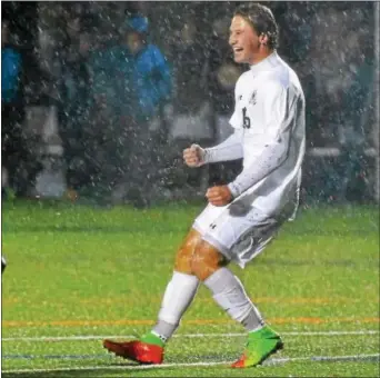  ?? PETE BANNAN — DIGITAL FIRST MEDIA ?? Bishop Shanahan’s Frank Jacob reacts to score the first of his two goals on the night against Grenncastl­eAntrim Tuesday evening at Downingtow­n West.