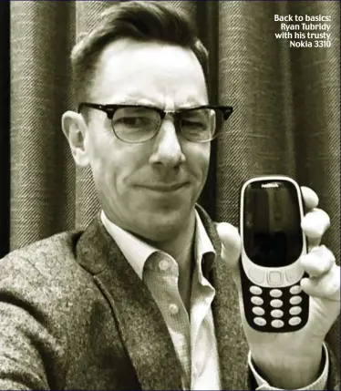  ??  ?? Back to basics: Ryan Tubridy with his trusty Nokia 3310