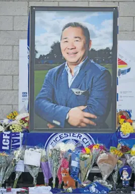  ?? Picture: AFP ?? REST IN PEACE. A portrait of Leicester City Football Club’s Thai chairman Vichai Srivaddhan­aprabha, who died in a helicopter crash at the club’s stadium, is seen amid flowers and tributes outside the King Power Stadium in Leicester yesterday.