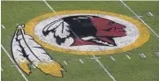  ?? ALEX BRANDON/ASSOCIATED PRESS ARCHIVE ?? The Washington Redskins logo is seen on the field in Landover, Md. The Supreme Court will consider if the law barring disparagin­g trademarks violates free speech rights.