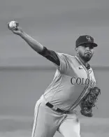  ?? JOE NICHOLSON/USA TODAY SPORTS ?? Rockies starting pitcher Germán Márquez throws against the Mariners during the first inning at T-Mobile Park on Sunday.