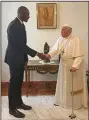  ?? (AP/Hernan Reyes Alcade) ?? Pope Francis welcomes Congolese-born Bismack Biyombo of the Phoenix Suns to the Vatican on Tuesday to talk about Congo and Biyombo’s foundation to help children in the African nation.