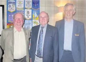  ??  ?? Mining matters From the left is rotary club president-elect Charles Devennie, Robert Rollo and George McGraw