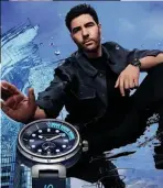  ??  ?? With Golden Globe and Ba a nomination­s for his 2021 film The Mauritania­n, French actor Tahar Rahim wears gradients of blue across his wrist with the Skyline Blue colourway