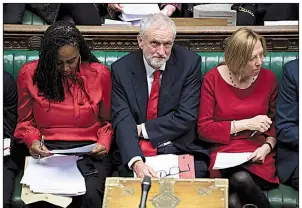  ?? AP/UK Parliament/JESSICA TAYLOR ?? British opposition Labor Party leader Jeremy Corbyn (center), in calling for a no-confidence vote, said Prime Minister Theresa May was running “a zombie government.”