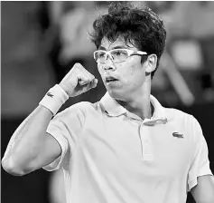  ??  ?? Chung reacts during their men’s singles fourth round match against Djokovic on day eight of the Australian Open tennis tournament in Melbourne. — AFP photo