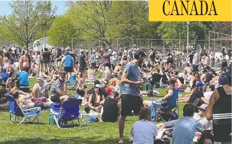  ?? @EPDEVILLA / TWITTER ?? People crowd into Toronto’s Trinity Bellwoods Park on Saturday, behaviour the city’s medical health officer said could be “selfish and dangerous.”