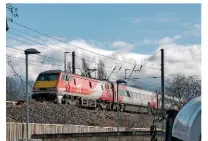  ?? LES NIXON. ?? Virgin Trains East Coast 91118 leads the 1100 London King’s Cross-Edinburgh Waverley through Northaller­ton on March 16. Class 91s were introduced from 1989 onwards, and will be replaced by Azumas.