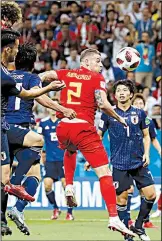  ?? AP/REBECCA BLACKWELL ?? Belgium’s Marouane Fellaini (center) scores on a header to tie Japan 2-2 in the 74th minute.