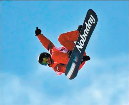  ?? WEI XIAOHAO / CHINA DAILY ?? Max Parrot competes in the men’s slopestyle final at Genting Snow Park in Zhangjiako­u on Feb 7.