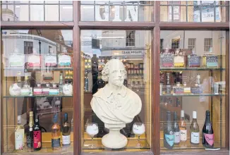  ?? ?? A Shakespear­e bust in the window of a liquor store in Stratford-upon-Avon.