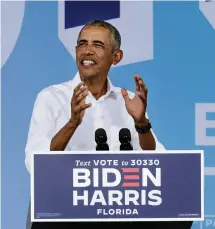  ?? PEDRO PORTAL pportal@miamiheral­d.com ?? Former President Barack Obama speaks during a drive-in car rally.