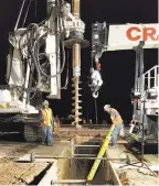  ?? COURTESY THE LOUIS BERGER GROUP ?? Constructi­on crew members in late 2016 drilled pilings for the underpass for pedestrian­s and bicyclists on St. Francis Drive.