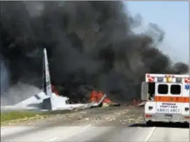  ?? JAMES LAVINE VIA AP ?? Flames and smoke rise from an Air National Guard C-130 cargo plane after it crashed near Savannah, Ga., Wednesday, May 2, 2018.