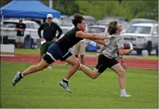  ?? STUART CAHILL — BOSTON HERALD ?? BBN’s Jack Kelley, left, shoves Milton’s Ronan Sammon during the North Regional 7v7 football championsh­ips on Friday in Exeter, N.H.