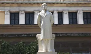  ?? (Yiannis Kourtoglou/Reuters) ?? A STATUE of Greek prime minister Charilaos Trikoupis is seen in front of the old parliament building in Athens yesterday. Trikoupis, in 1893, made his famous comment: ‘Unfortunat­ely, we are bankrupt.’