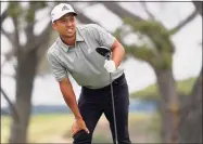  ?? Jae C. Hong / Associated Press ?? Xander Schauffele watches his shot from the fifth tee during the final round of the U.S. Open on June 20 at Torrey Pines Golf Course in San Diego. Schauffele was No. 427 in the world when the Olympics last were held. Now he's part of the U.S. team in Tokyo.