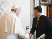  ?? POOL PHOTO VIA AP L’OSSERVATOR­E ROMANO/ ?? Pope Francis greets Bernice King, the youngest child of civil rights leader Martin Luther King Jr., for a private audience Monday at the Vatican.