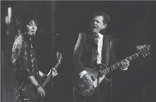  ?? SEAN KILPATRICK/THE CANADIAN PRESS ?? Michael J. Fox, right, performs onstage with rocker Joan Jett during the Governor General’s Performing Arts Awards gala at Rideau Hall on Thursday.
