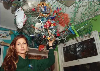  ??  ?? Courtown Seal Rescue Centre’s Melanie Croce with some plastic for upcycling. SEE PAGE 7