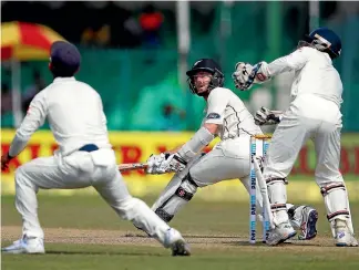  ?? REUTERS ?? Kane Williamson looks on nervously after playing a shot in in Kanpur yesterday.