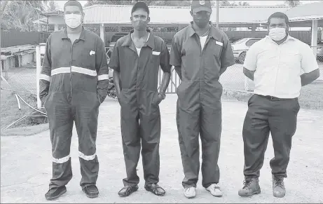  ??  ?? Some of the workers who have been forced to wear casual shoes to perform their duties after the BBCI management refused to replace their damaged safety boots