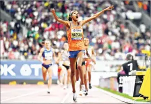  ?? JEWEL SAMAD/AFP ?? Netherland­s’ Sifan Hassan wins the women’s 1500m final at the 2019 IAAF Athletics World Championsh­ips at the Khalifa Internatio­nal stadium in Doha on Saturday.