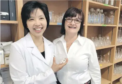  ??  ?? Edmonton gastroente­rologist Dr. Dina Kao, left, treated Karen Shandro for C. difficile in a clinical trial using frozen capsules of fecal transplant. After just a few days of treatment, Shandro has felt well ever since.