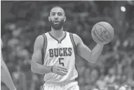  ?? JEFF HANISCH/USA TODAY SPORTS ?? Kendall Marshall appeared in 28 games for the Bucks during the 2014-15 season.