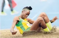  ?? TAYLOR/PHOTOGRAPH­ER GLADSTONE ?? Dwayne Extol/Gleaner Writer Current G.C. Foster College student Tissanna Hickling jumps 13.26m while representi­ng St Jago at the ISSA/GraceKenne­dy Boys and Girls’ Athletics Championsh­ips at the National Stadium last year.