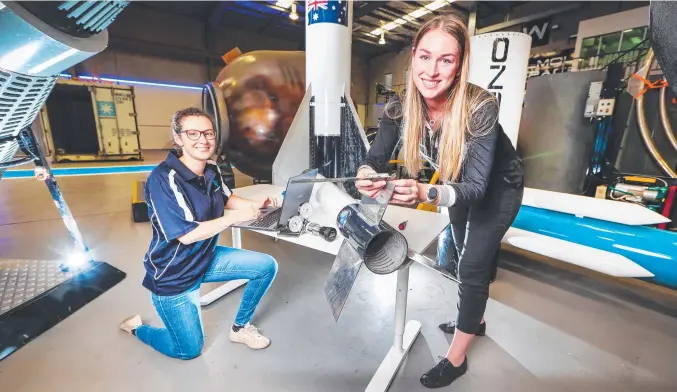  ?? ?? Propulsion engineers Kelly Mulvay and Kristin Stewart are at the forefront of the space industry at Gold Coast-based Gilmour Space Technologi­es. Picture: Nigel Hallett